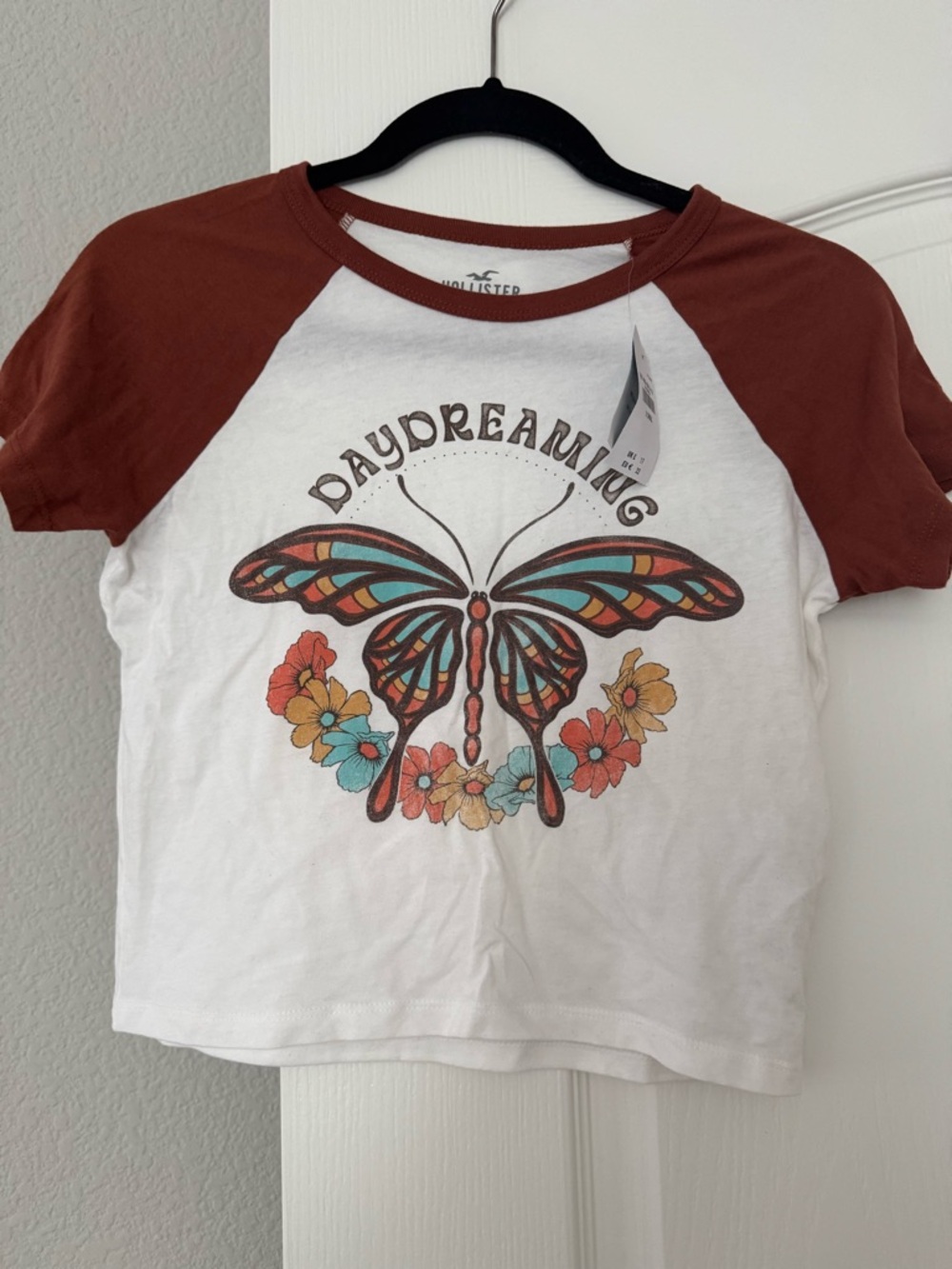Hollister White Tee with Rust Raglan Sleeves and Colorful Butterfly Graphic